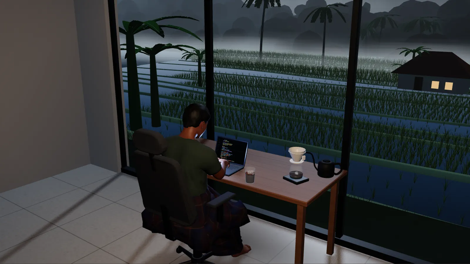 Before sunrise in a West Java countryside home: a man in a T-shirt and checkered sarong types on a laptop at a wooden desk, an iced coffee and pour-over set beside him, misty rice terraces and village roofs outside the tall window.